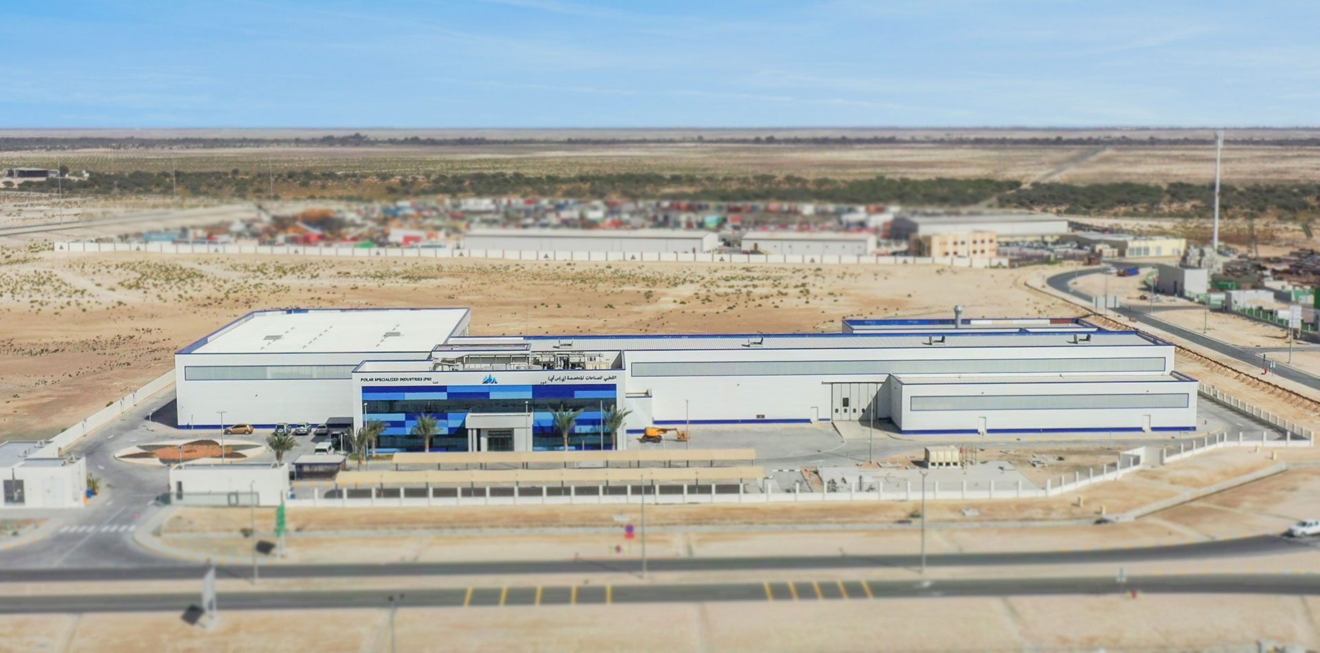 Polarspec facility in Abu Dhabi with engineers at work on pressure vessels and specialized containers